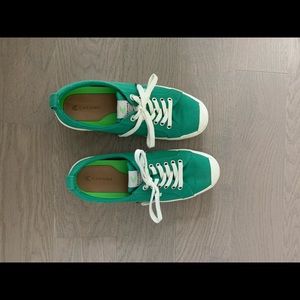 Woman’s green canvas sneakers